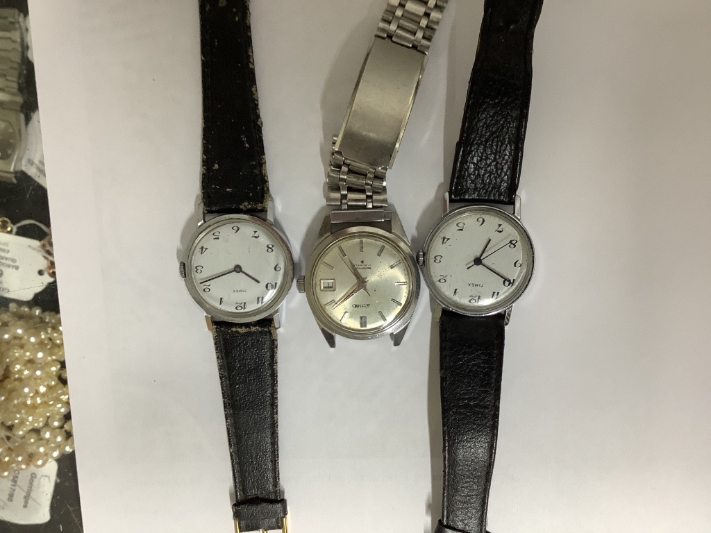 A collection of assorted lady's and gentleman's wristwatches including Timex, Accurist and Seiko.